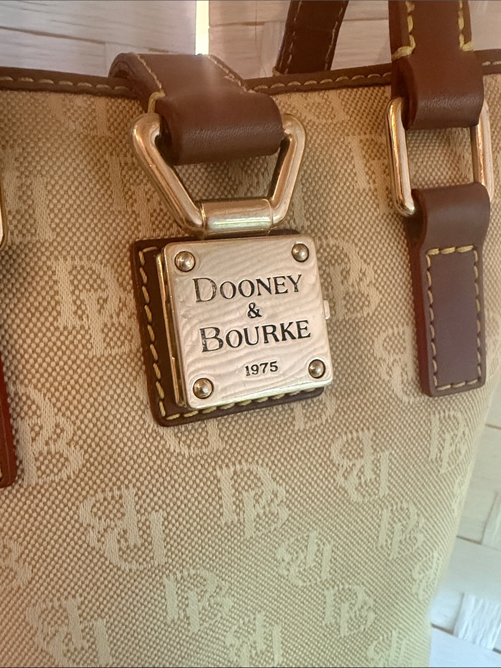 Dooney and Bourke Beige Canvas Bucket Tote with Brown Leather Trim - Picture 3 of 8